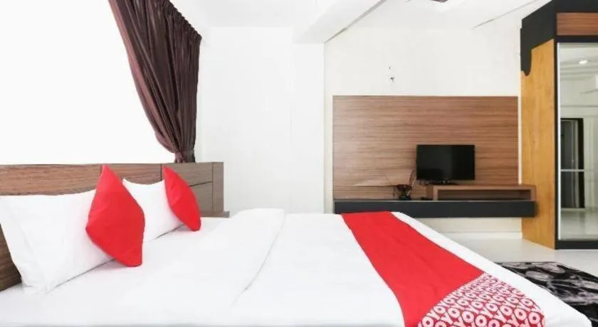 Bed in OYO 89888 DZ Residence Guest House