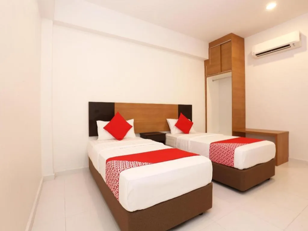 Bed in OYO 89888 DZ Residence Guest House