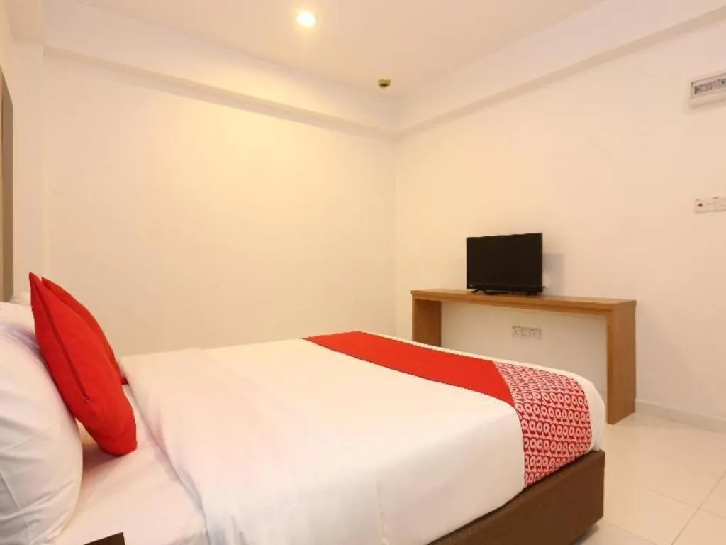 Bed in OYO 89888 DZ Residence Guest House