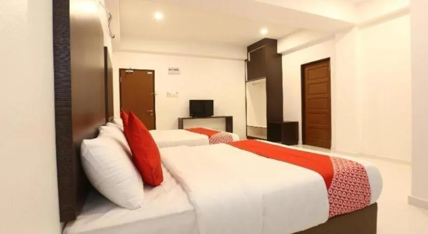 Bed in OYO 89888 DZ Residence Guest House