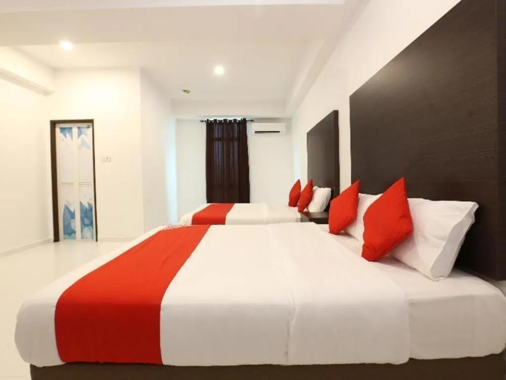 Bed in OYO 89888 DZ Residence Guest House