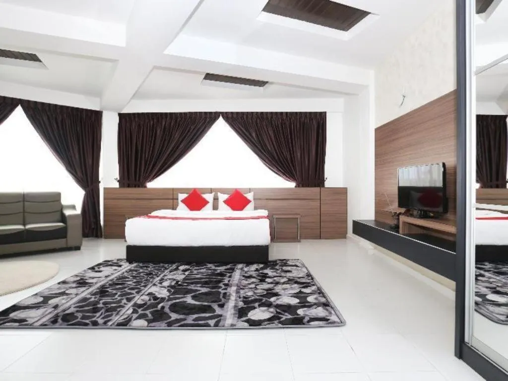 Bed in OYO 89888 DZ Residence Guest House