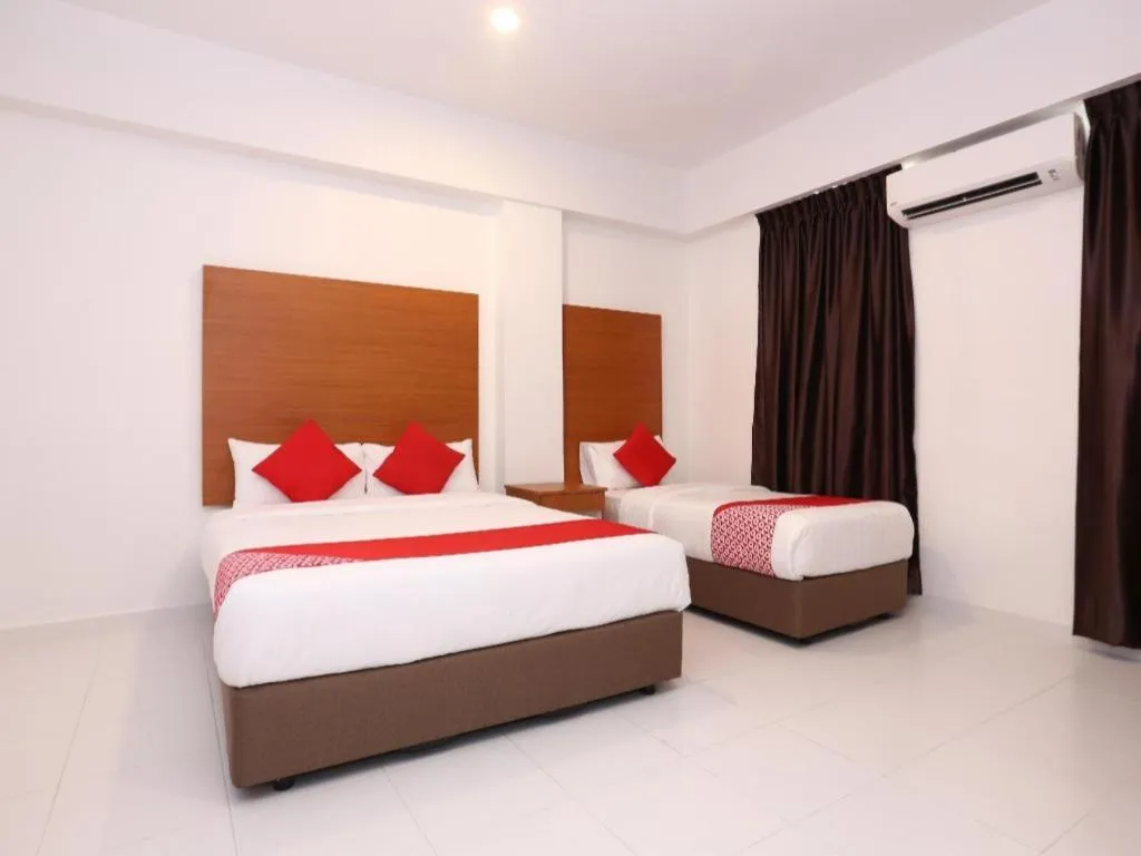 Bed in OYO 89888 DZ Residence Guest House