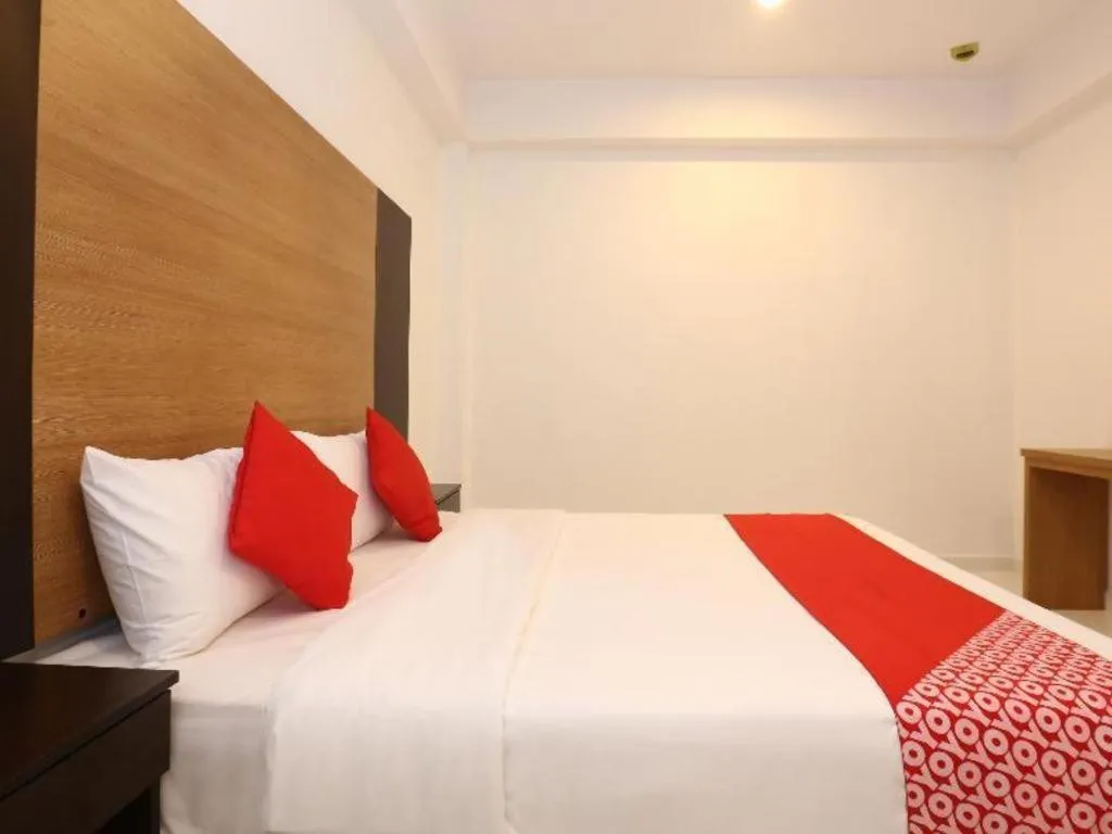 Bed in OYO 89888 DZ Residence Guest House