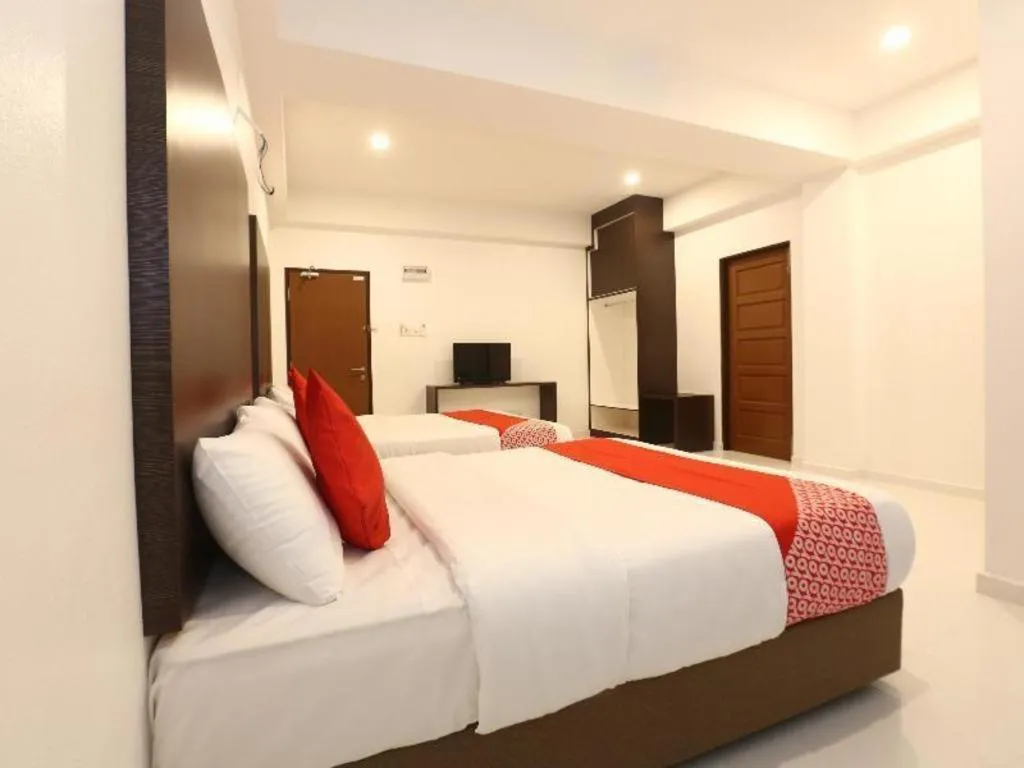 Bed in OYO 89888 DZ Residence Guest House