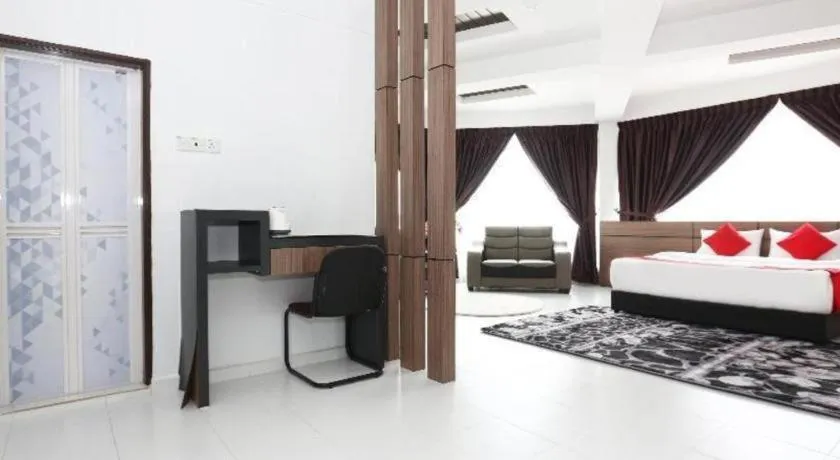 Bed in OYO 89888 DZ Residence Guest House