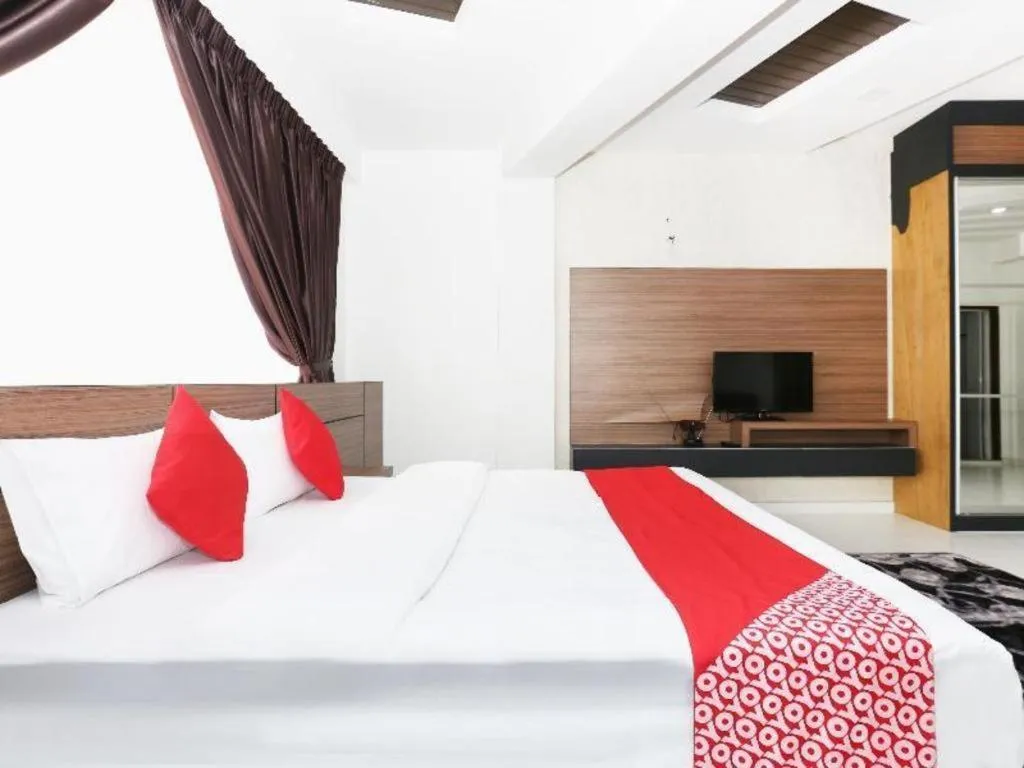 Bed in OYO 89888 DZ Residence Guest House