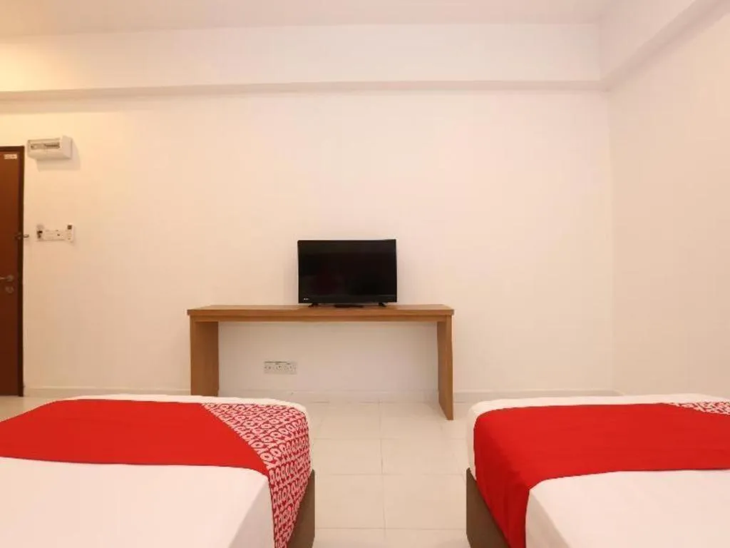 Bed in OYO 89888 DZ Residence Guest House