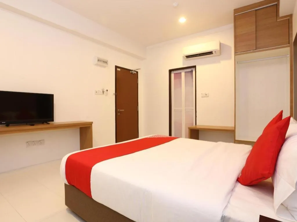 Bed in OYO 89888 DZ Residence Guest House