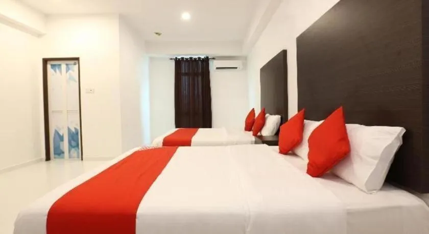 Bed in OYO 89888 DZ Residence Guest House