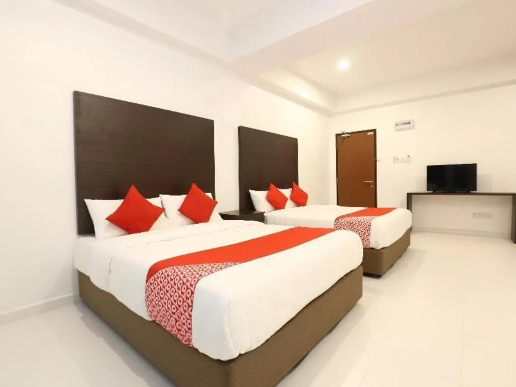 Bed in OYO 89888 DZ Residence Guest House