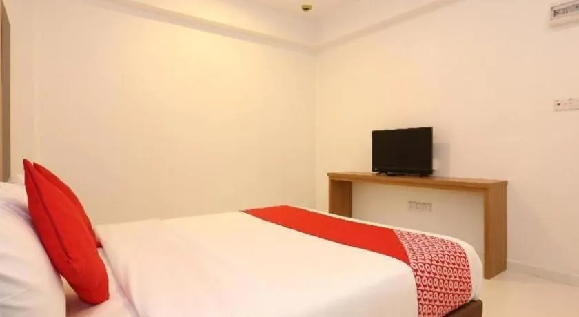 Bed in OYO 89888 DZ Residence Guest House