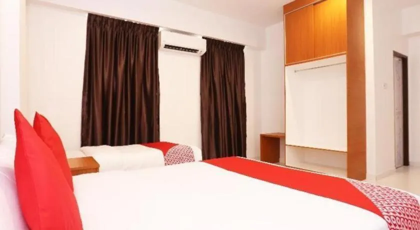 Bed in OYO 89888 DZ Residence Guest House