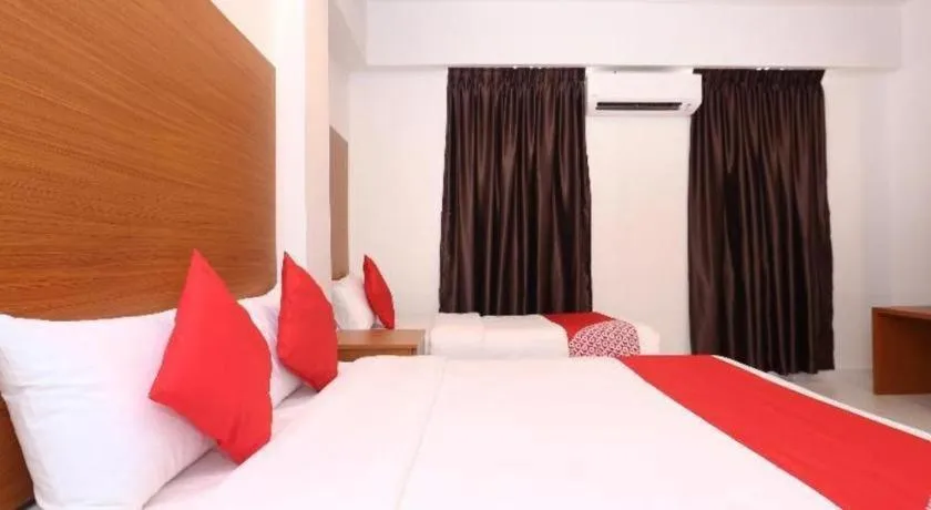 Bed in OYO 89888 DZ Residence Guest House