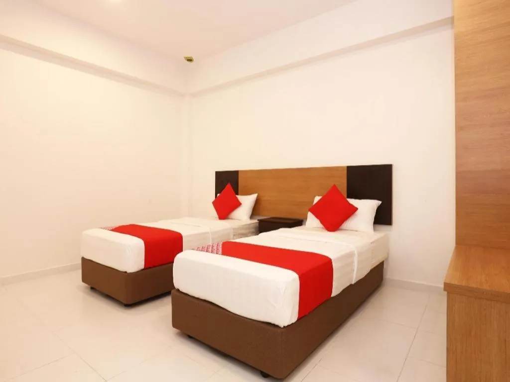 Bed in OYO 89888 DZ Residence Guest House