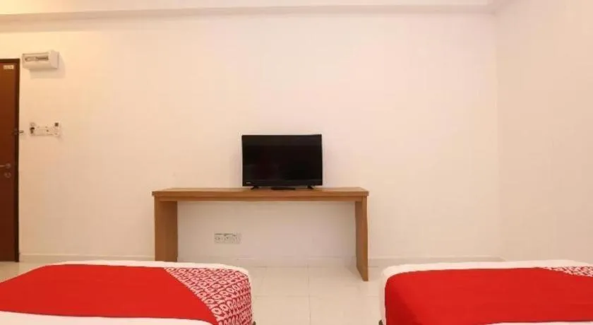 Bed in OYO 89888 DZ Residence Guest House