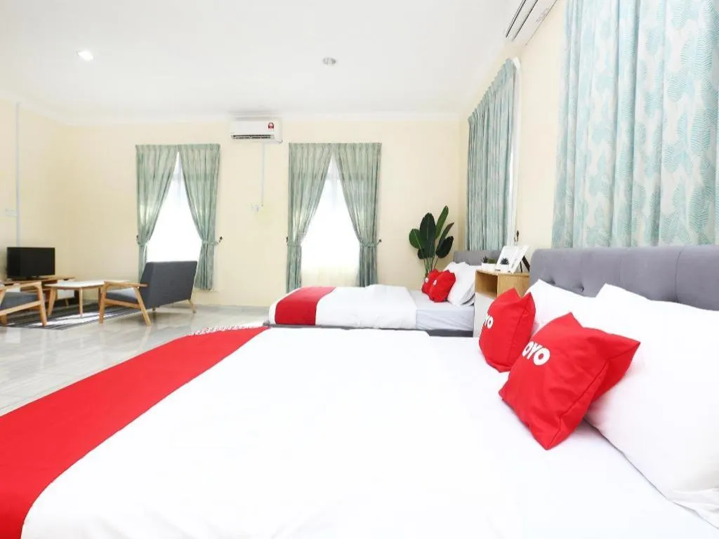 Bed in OYO 89607 Aloha Chalet