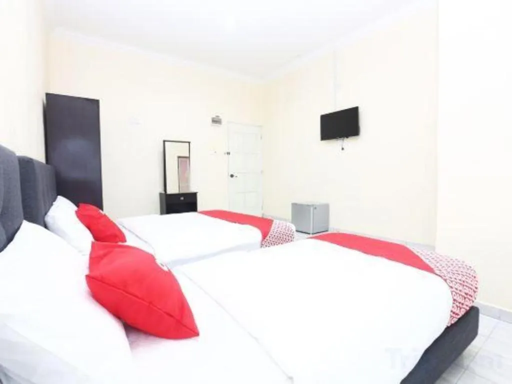 Bed in OYO 89607 Aloha Chalet