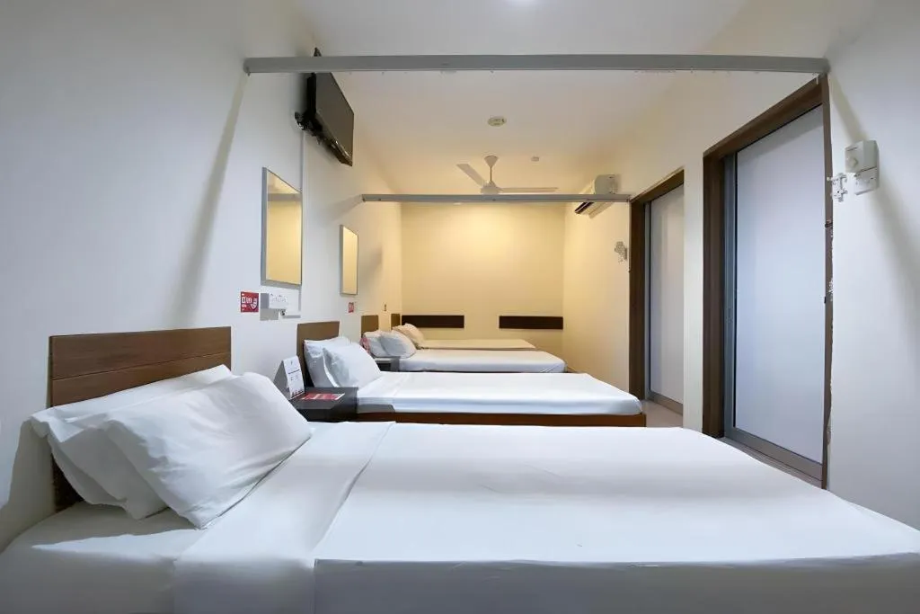 Bed in SPOT ON 91178 Motel Impian