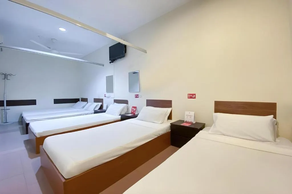 Bed in SPOT ON 91178 Motel Impian