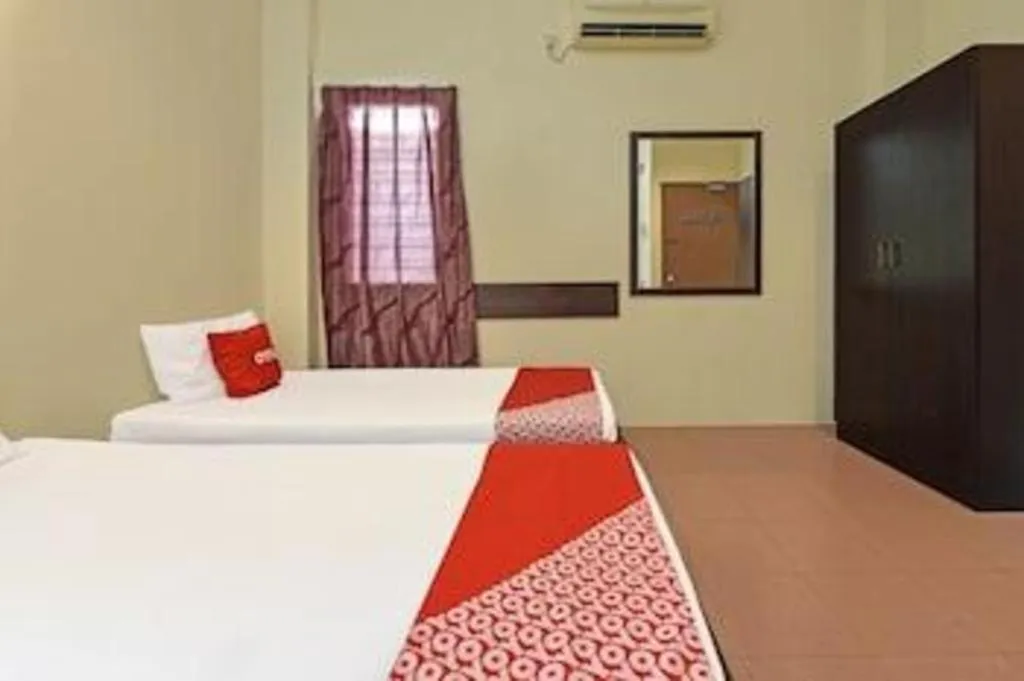 Bed in SPOT ON 91178 Motel Impian