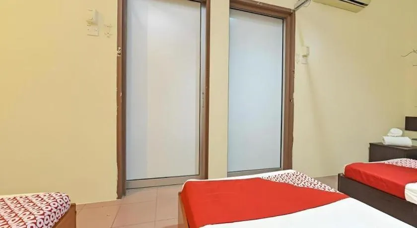 Bed in SPOT ON 91178 Motel Impian