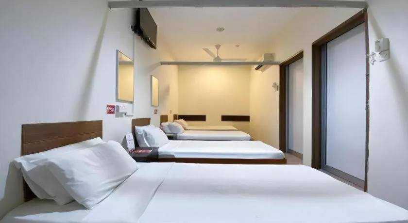 Bed in SPOT ON 91178 Motel Impian