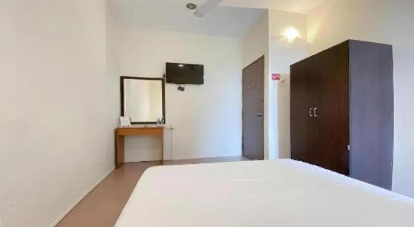 Bed in SPOT ON 91178 Motel Impian