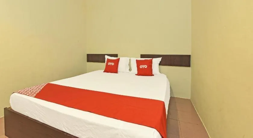 Bed in SPOT ON 91178 Motel Impian