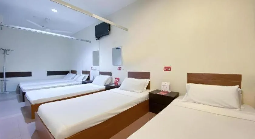 Bed in SPOT ON 91178 Motel Impian