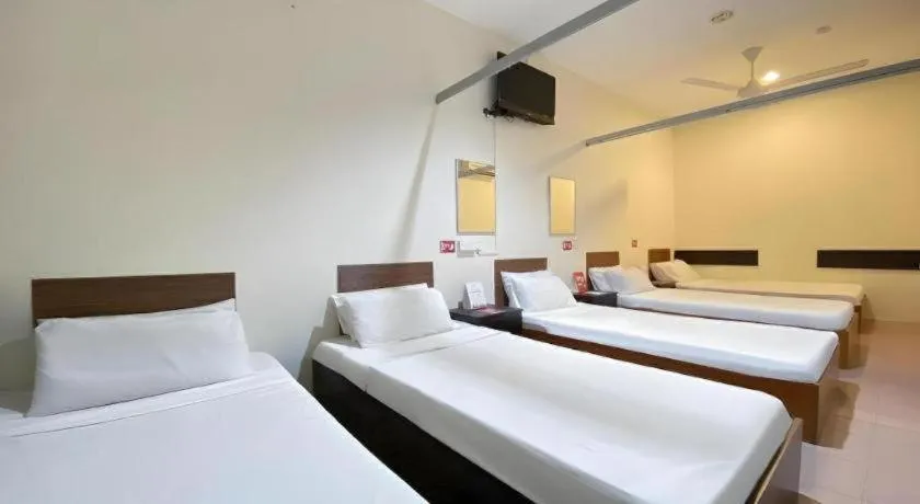 Bed in SPOT ON 91178 Motel Impian