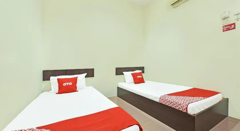 Bed in SPOT ON 91178 Motel Impian