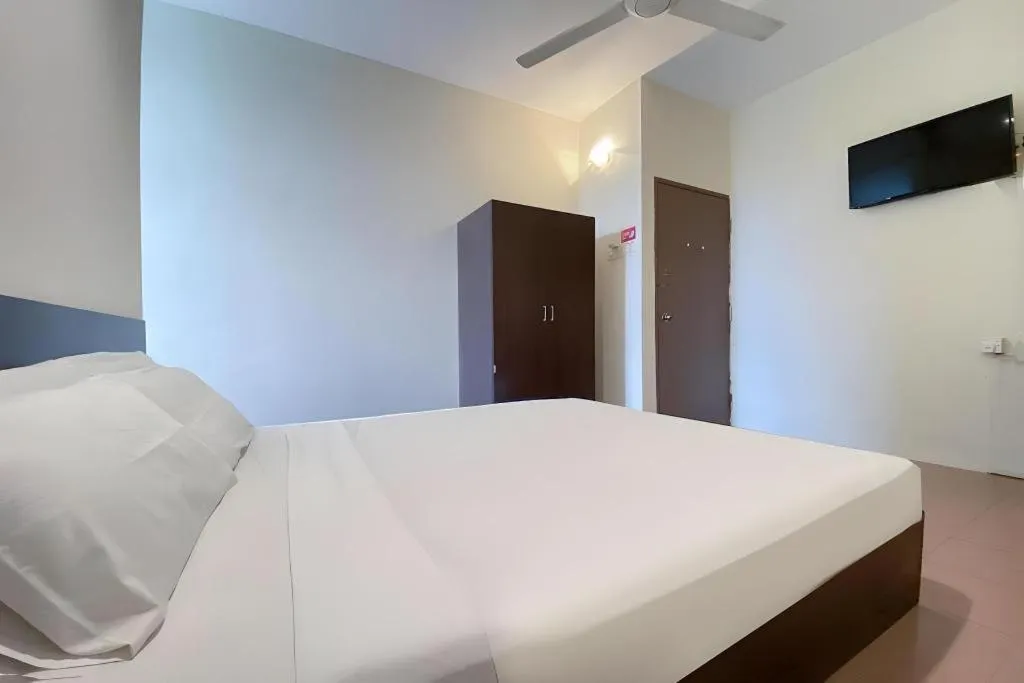 Bed in SPOT ON 91178 Motel Impian