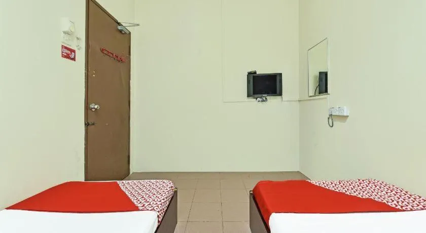 Bed in SPOT ON 91178 Motel Impian