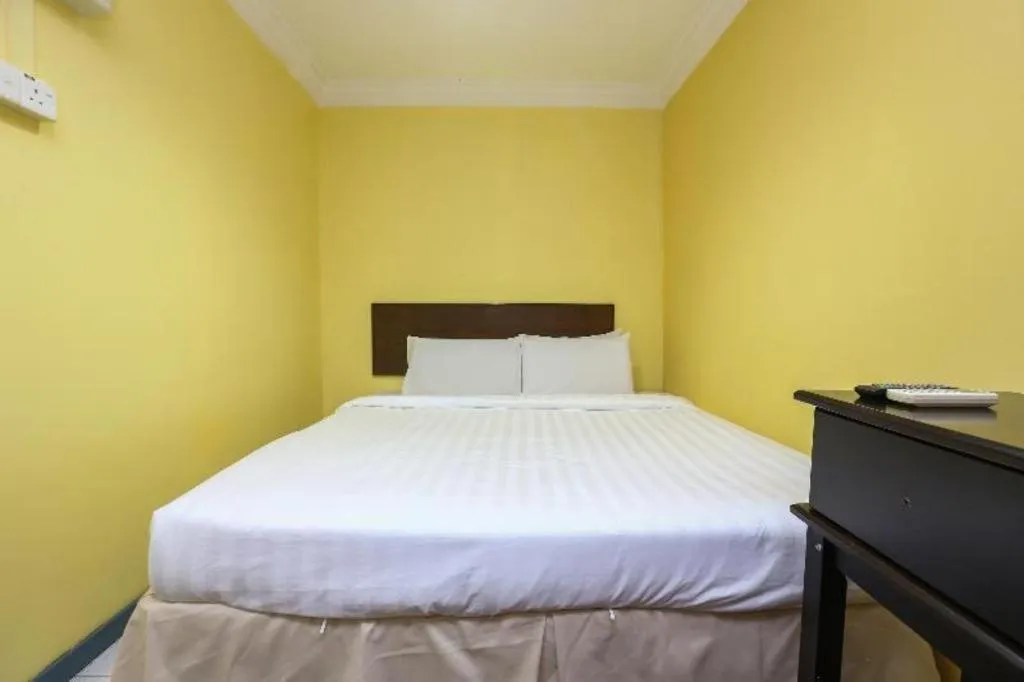 Bed in OYO 89822 Hotel As Salam