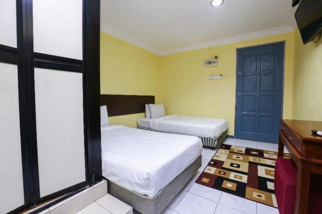 Bed in OYO 89822 Hotel As Salam