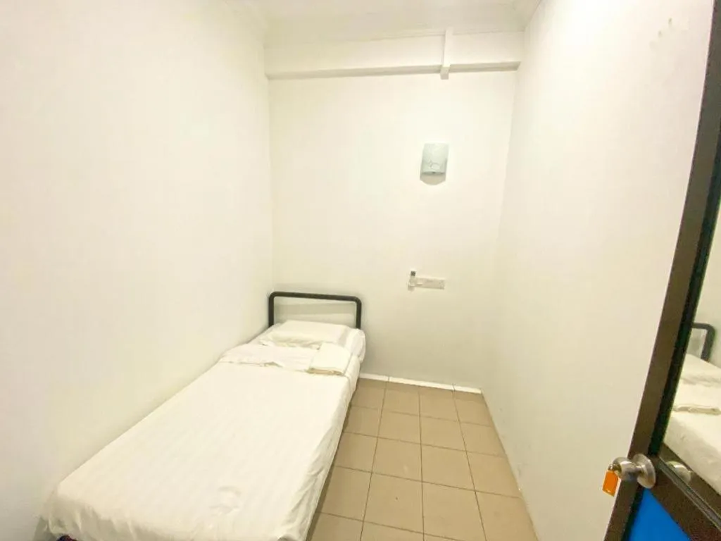 Bed in SPOT ON 90077 Cherry's Lodge