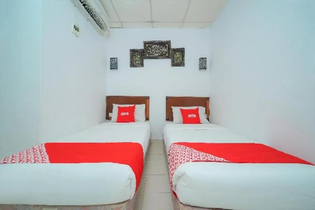 Bed in OYO 89850 Mutiara Motel