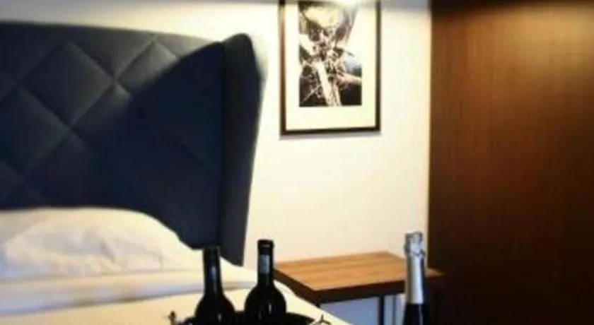 Bed in Cube 8teens Boutique Suite by Nest Home