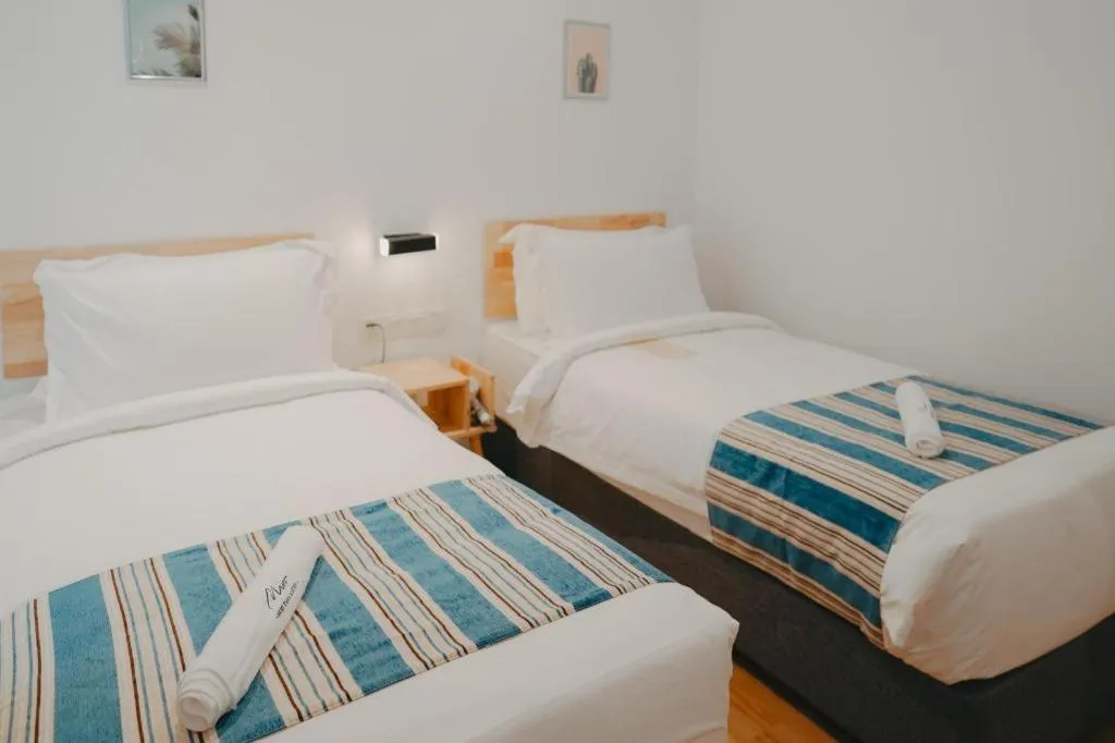 Bed in Bilik-Bilik by MUO