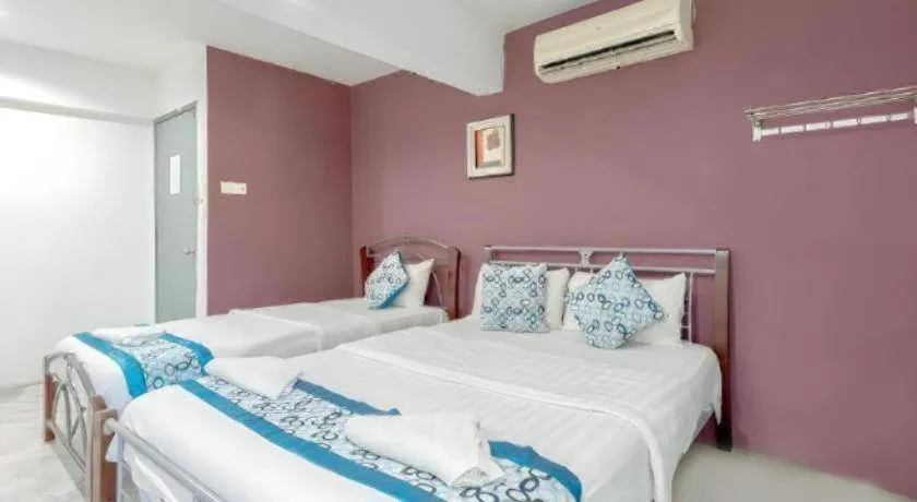 Bed in OYO 89874 Gs Golden Star Hotel