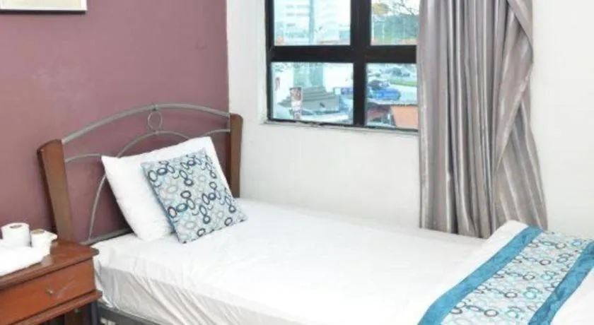 Bed in OYO 89874 Gs Golden Star Hotel