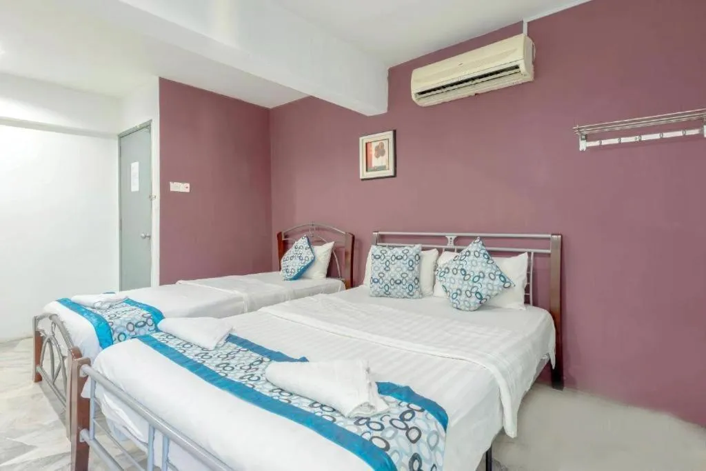 Bed in OYO 89874 Gs Golden Star Hotel