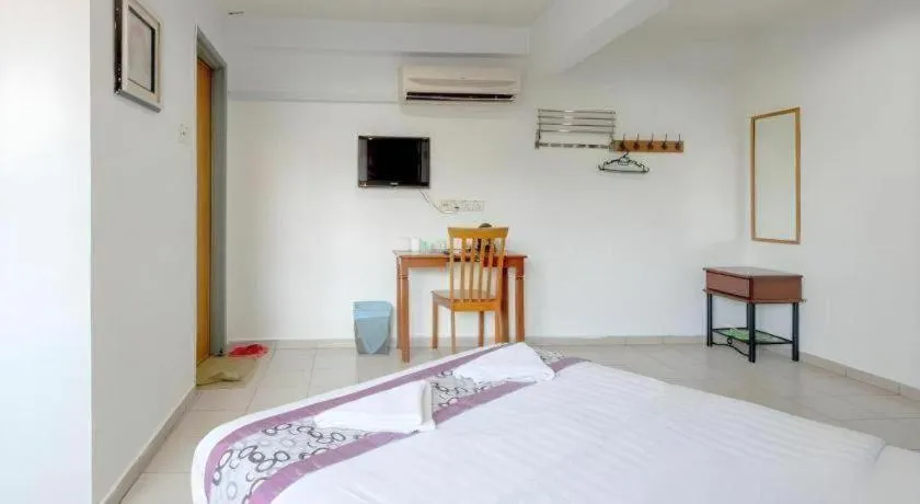 Bed in OYO 89874 Gs Golden Star Hotel