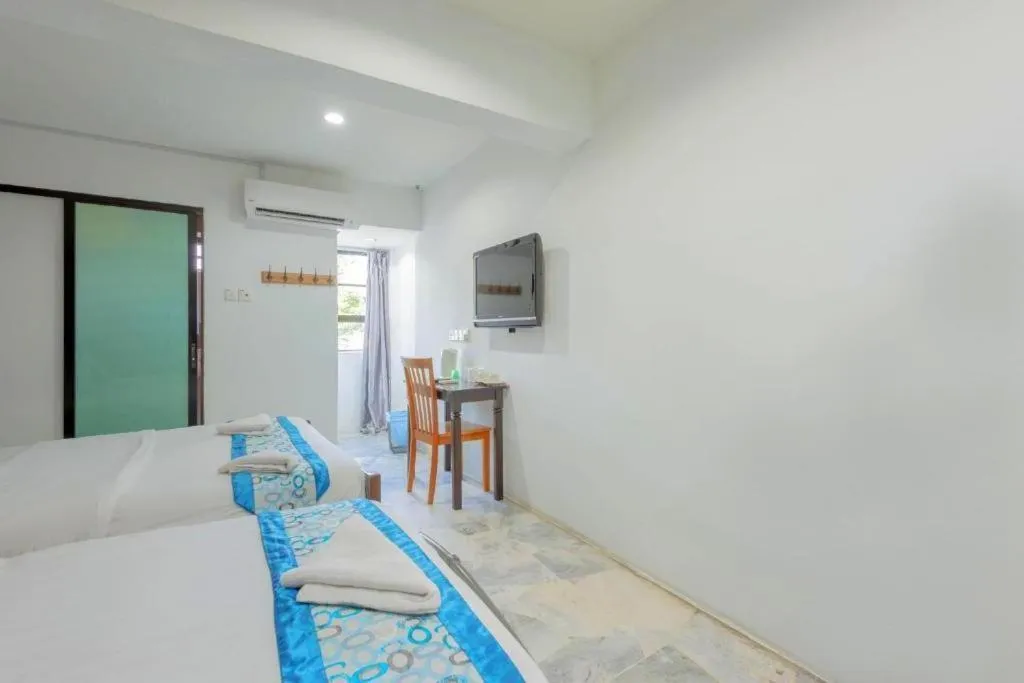 Bed in OYO 89874 Gs Golden Star Hotel