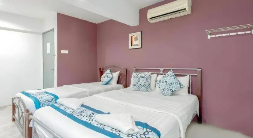 Bed in OYO 89874 Gs Golden Star Hotel