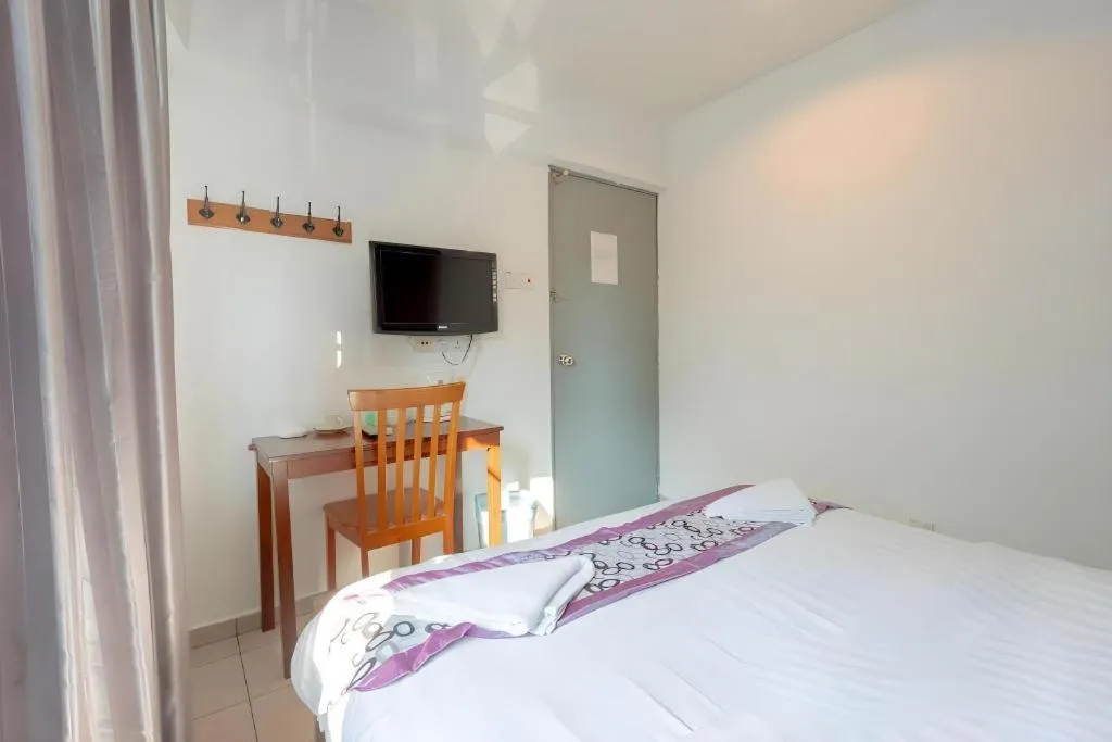 Bed in OYO 89874 Gs Golden Star Hotel