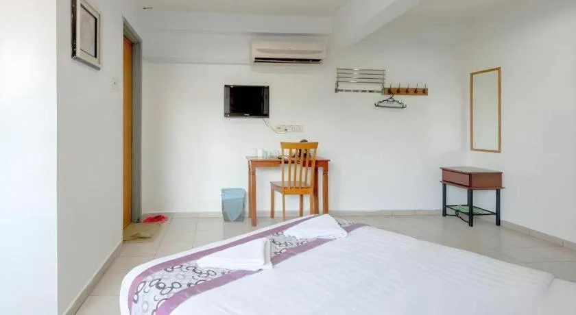 Bed in OYO 89874 Gs Golden Star Hotel