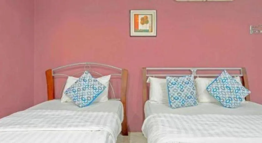 Bed in OYO 89874 Gs Golden Star Hotel