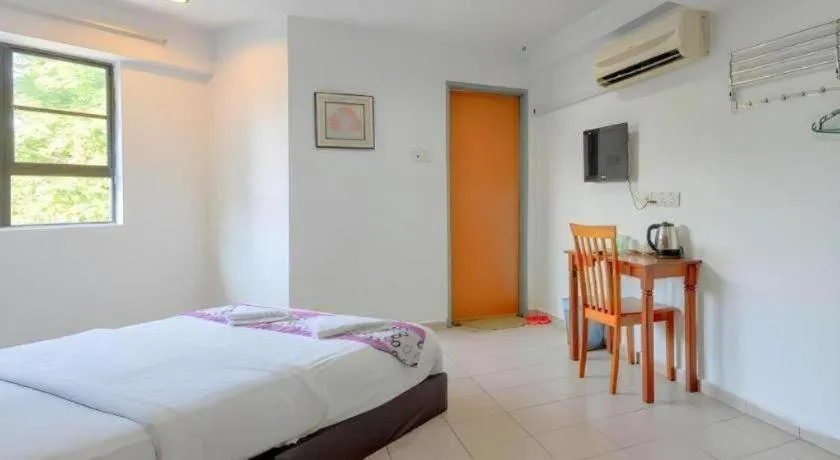 Bed in OYO 89874 Gs Golden Star Hotel